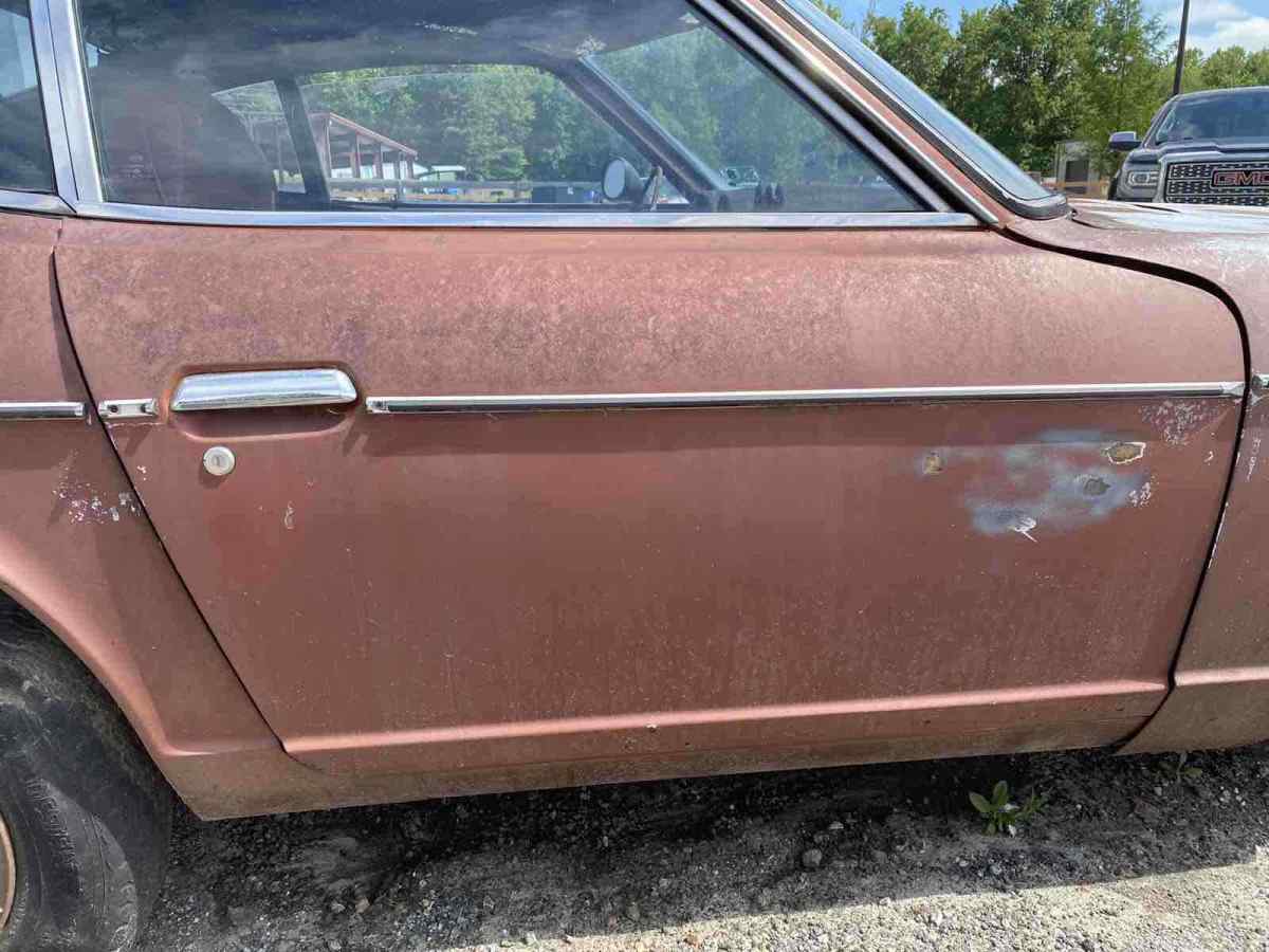 1974 datsun 260z hatchback orange rwd manual
