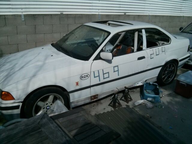 1992 bmw 325i - stripped with partial cage- no time to race anymore :(