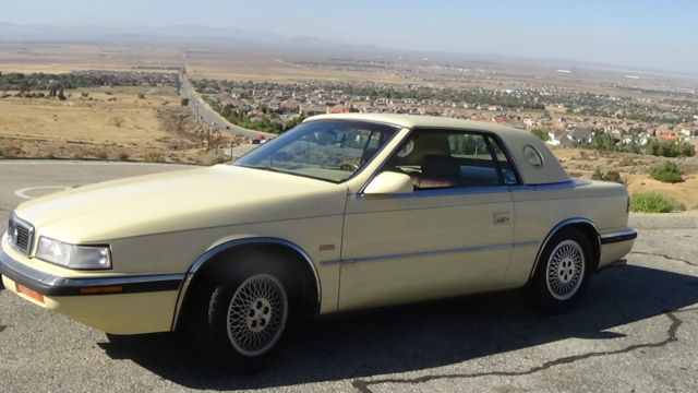 1989 chrysler tc, manual, ohc 16 valve maserate engine. good condition, yellow