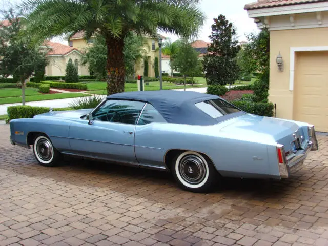 excellent condition, 50,000 miles, fully loaded convertible