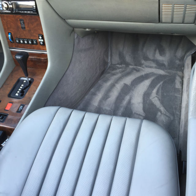 mercedes benz 560sl coupe/roadster, white with gray interior