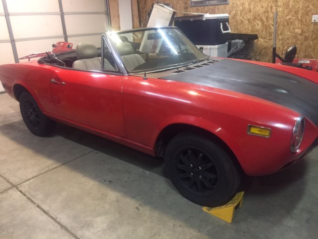 1977 fiat 124 spider convertible, red and black, 81,000 original miles, 5 speed