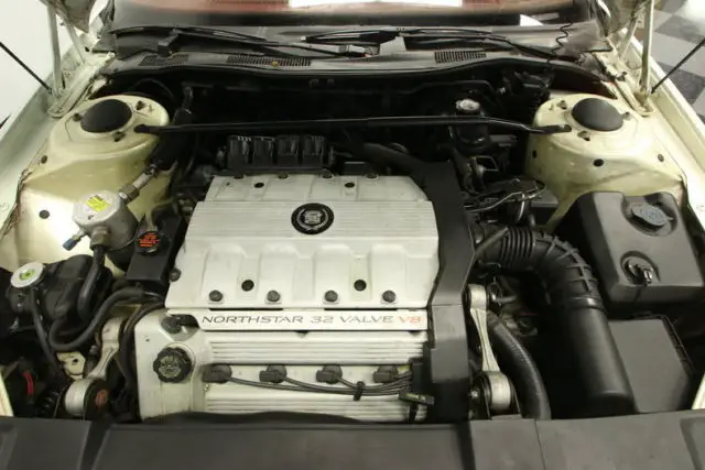 only 2 owners, northstar 4.6 295hp v8, 83k actual miles, super clean, cold ac