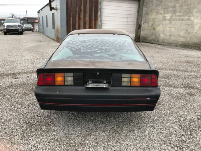 1985 camaro iroc-z, with extra, new parts and an original service/parts manual!!