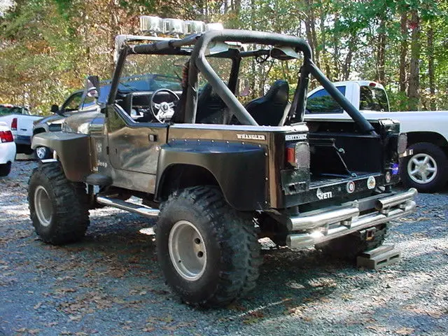 90 jeep wrangler yj. 6cyl. 5spd. new 35" super swamper tires. no reserve!!