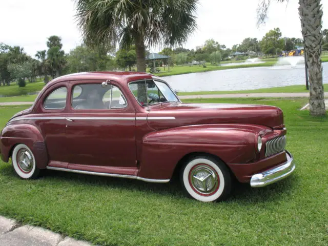 retro. 50's 1947 mercury coupe rod, fly in, drive home