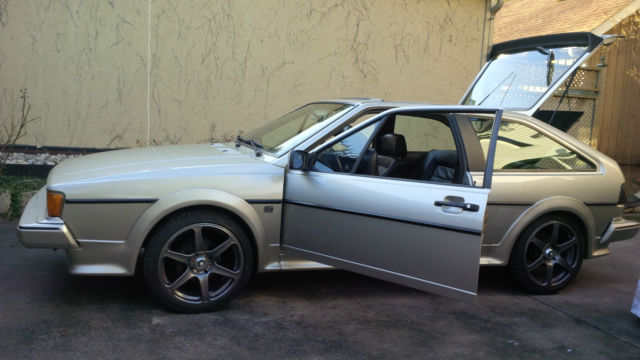 8v 5spd - zermatt silver / black leather