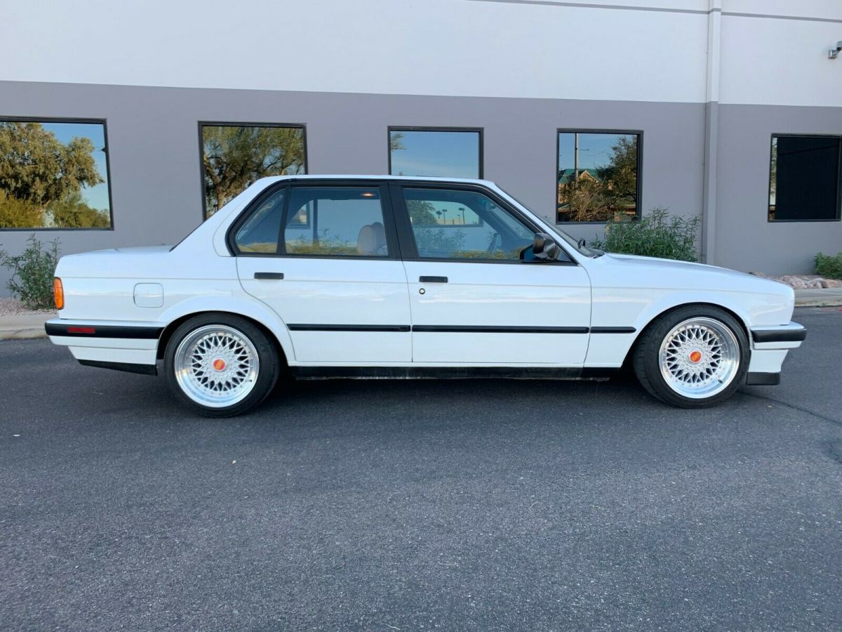 1990 bmw 325i e30 sedan with e39 m5 s62 4.9l v8 engine swap in alpine white 2