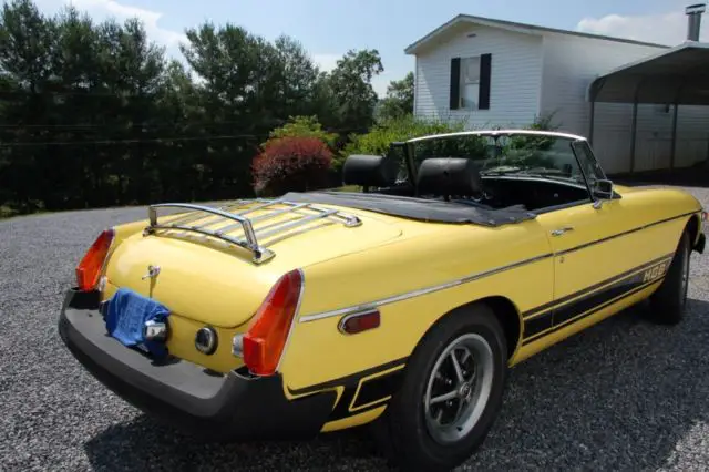 mg mgb convertible yellow sports car