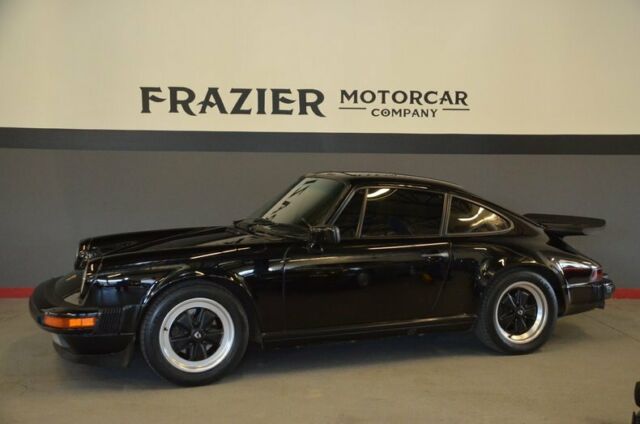 original paint three owner black/tan sunroof carrera coupe with records