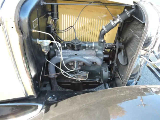 1929 ford model a yellow/black restored tudor style