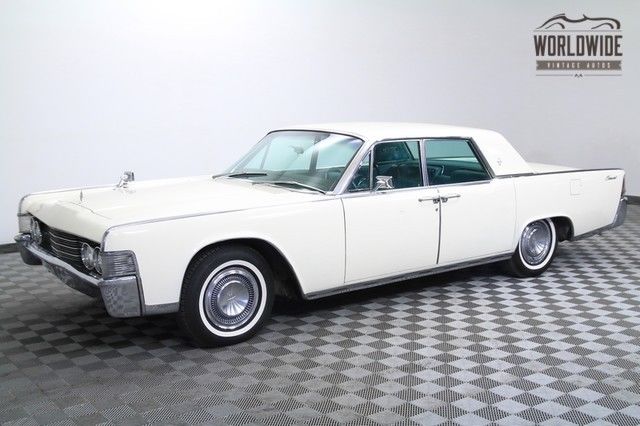 1965 lincoln continental. suicide doors. restored. white walls! 430 v8!