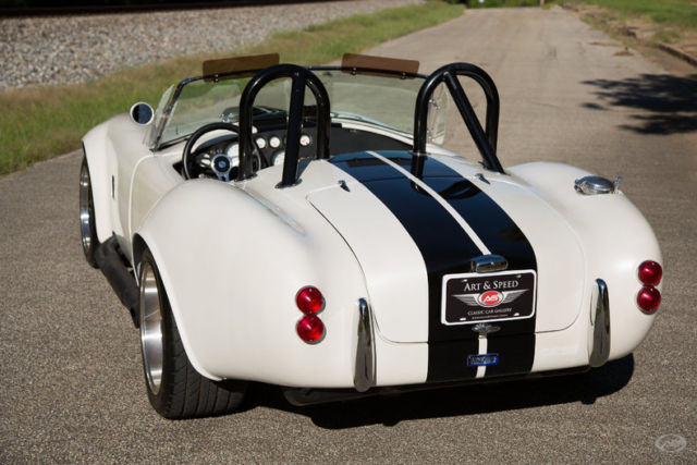 '65 shelby cobra replica (factory five): boxer in a white linen suit