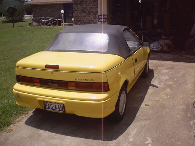 1992 (yellow) geo metro convertible (salvage – front end damaged)