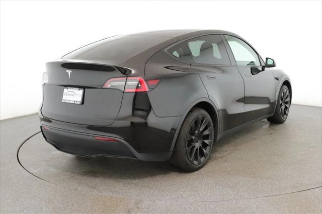 2021 tesla model y standard range rear-wheel drive