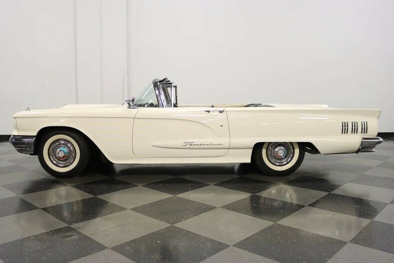 very classy square bird! 352 v8, auto, factory colors, power top, great cruiser!