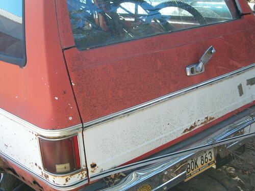 1974 suburban c10 custom deluxe. rusty and has dents. 350 engine with no transmi