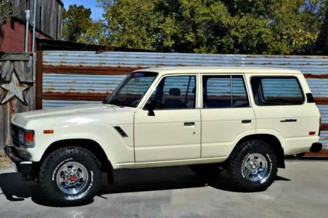 84 fj60, fresh paint, a/c, new interior !!