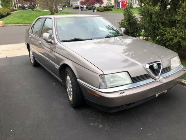 1994 164 ls, 3l 4 cam engine champagne with saddle interior, like new, sunroof
