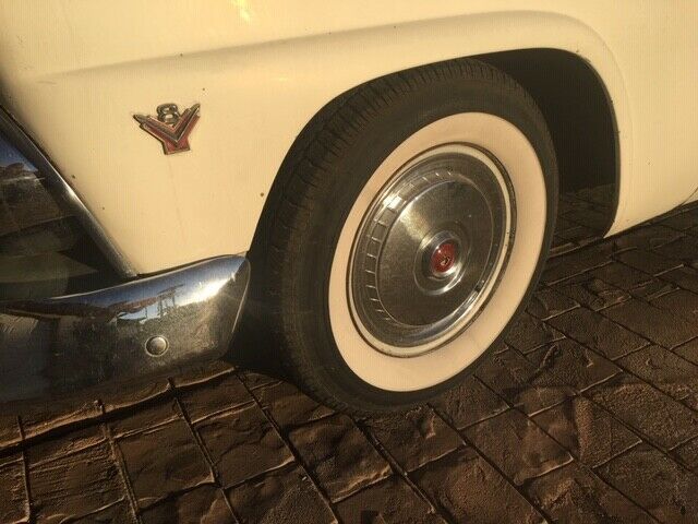 girl must let go of her sweet ride. 1955 ford fairlane town sedan