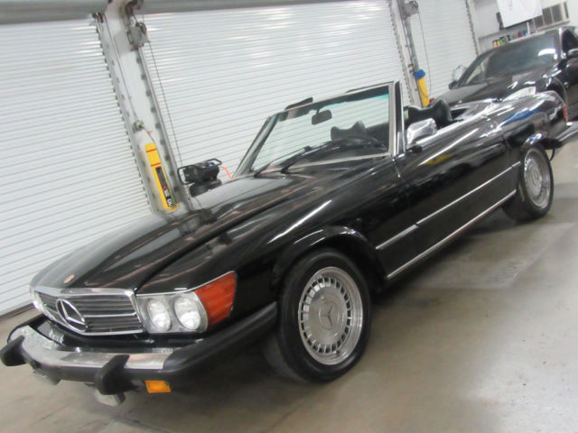 triple black 60000 miles garage kept non smoker and absolutely stunning!