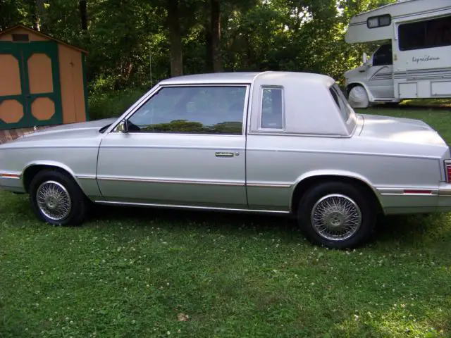 1984 chrysler lebaron 2 door sport coupe last 24 yrs,in heated garage on blocks