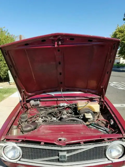 vintage volvo 144 240 sedan red classic 4-speed retro datsun classic no reserve