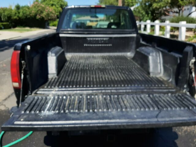 black, 4x4 , extended cab, 2 door, short bed 6 ft