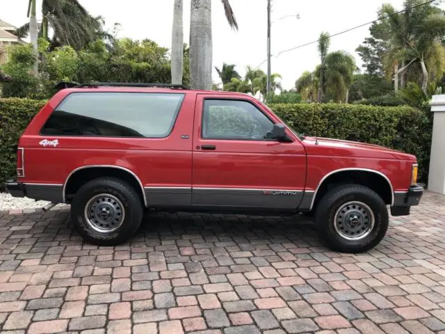 1991 gmc jimmy, red with 67,000 miles available now!