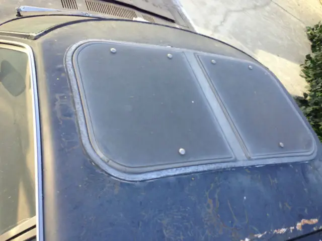 datsun 1973 240z with t-top. not running. mostly intact.restore or salvage parts