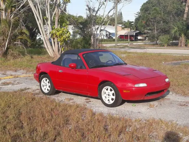 red 1990 mazda mx-5 miata 5 speed manual