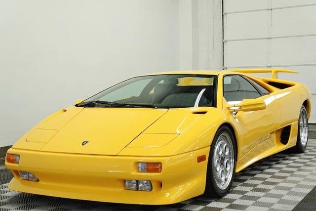 1992 lamborghini diablo super fly yellow black leather inter only 12,500 miles