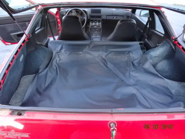 1984 porsche 944, 5 speed, red w/ black interior, power windows, locks and roof