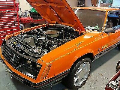 1979 ford mustang hatchback orange rwd manual cobra
