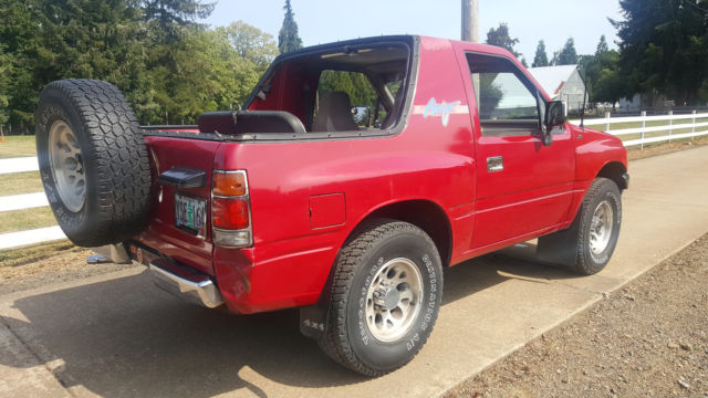 1991 isuzu amigo xs 2.6l 5-speed 4x4, soft top