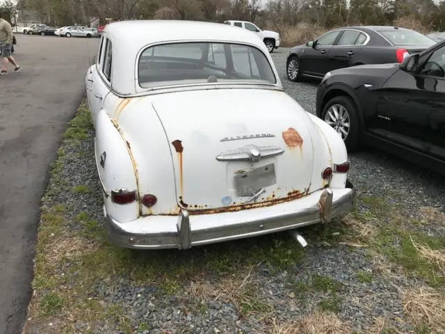 1950 plymouth deluxe flat 6 cylinder motor with 3 soeed trans white color