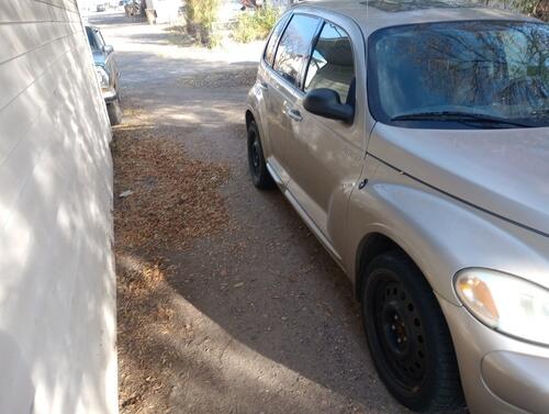 2004 chrysler pt cruiser gt turbo. 111,000 miles. gold with black interior. black