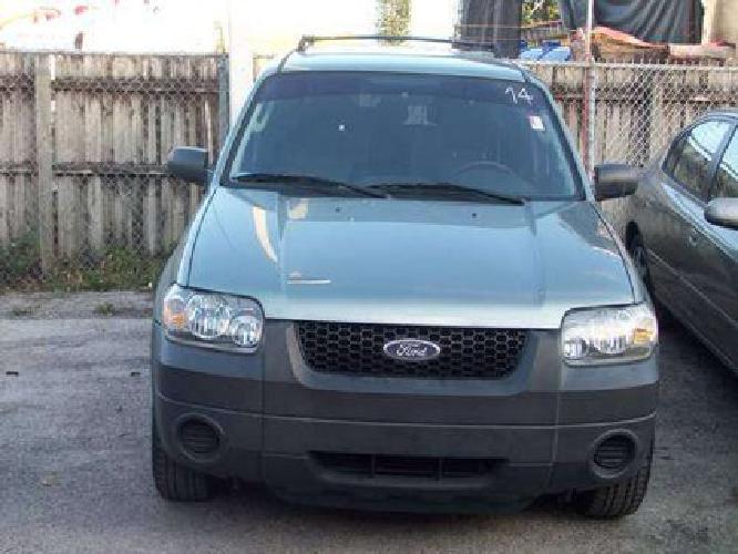 2005 ford escape green....... in miami, fl