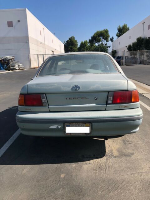 1991 green toyota tercel dx auto 4 cylinder 4 door