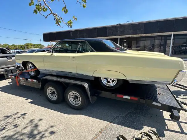 1966 pontiac grand prix coupe yellow rwd automatic coupe
