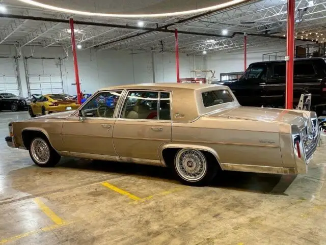 1986 cadillac fleetwood brougham d’elegance sedan brown rwd automatic d’elegance