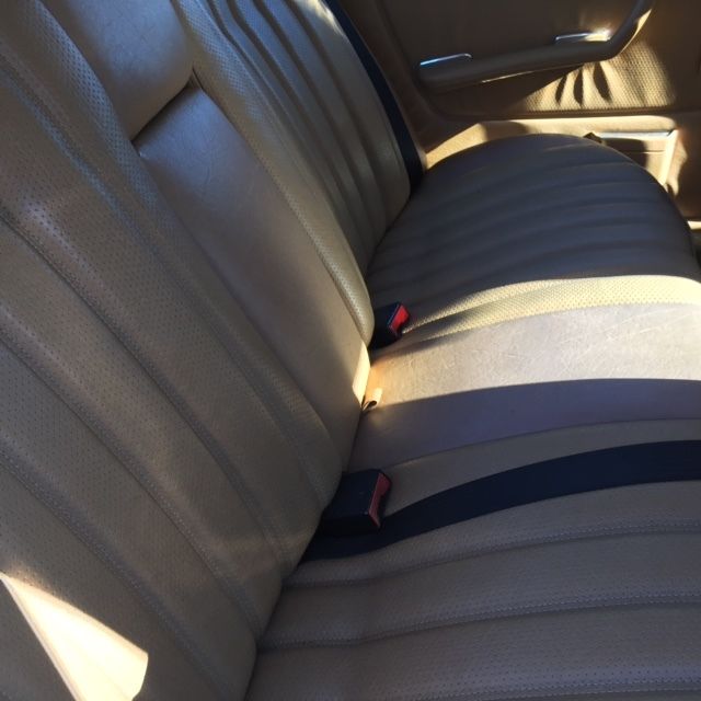 excellent condition. 4-door. yellow. refurbished wheels and new tires