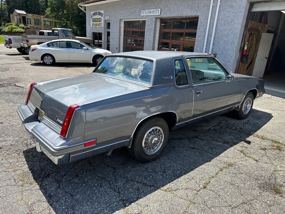 1985 oldsmobile cutlass supreme coupe grey rwd automatic brougham