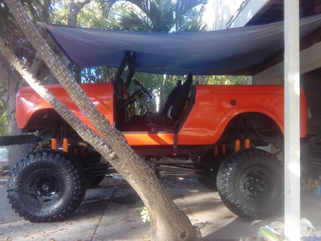 1970 scout custom. v8. auto trans. lifted on 37" tires on beadlock wheels