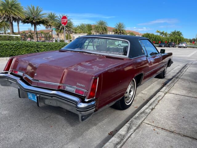 1973 oldsmobile toronado coupe red