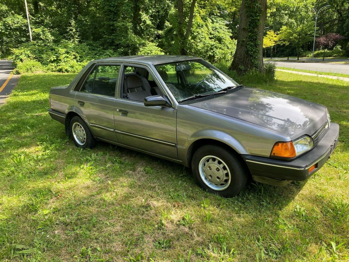 one owner only 48k from new a 1989 mazda 323 base sedan good condition