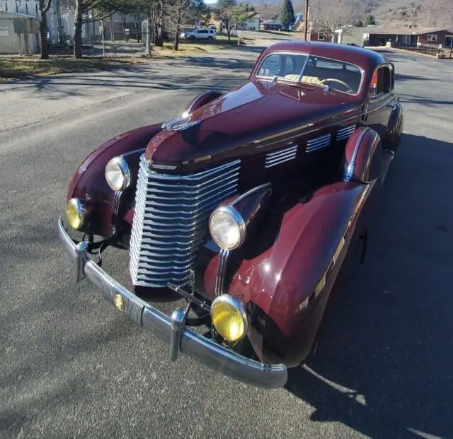 1938 cadillac two passenger coupe. series 60 opera with folding jump seats
