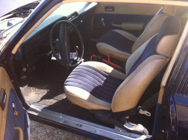 1976 nova restored - dark blue w/ muncie 4 speed standard