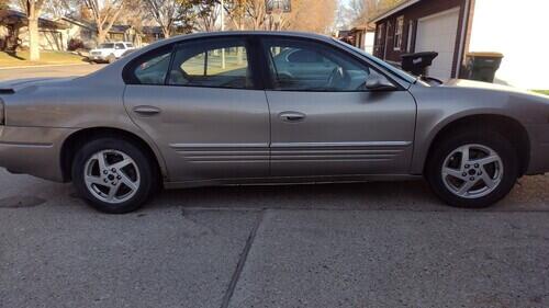 2004 pontiac bonneville 3.8 motor. has 190000 miles runs great. tires fair. small