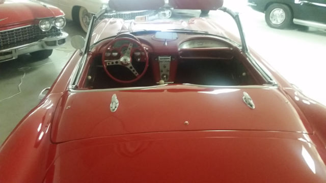 1959 chevrolet corvette convertable, red & white